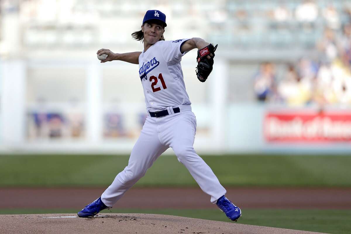 FILE - In this Oct. 16, 2015, file photo, Los Angeles Dodgers starting pitcher Zack Greinke works against a New York Mets batter during the first inning in Game 5 of baseball's National League Division Series in Los Angeles. The NL Cy Young Award contender Greinke could opt out of his contract to seek bigger riches on the free agent market. (AP Photo/Gregory Bull, File)