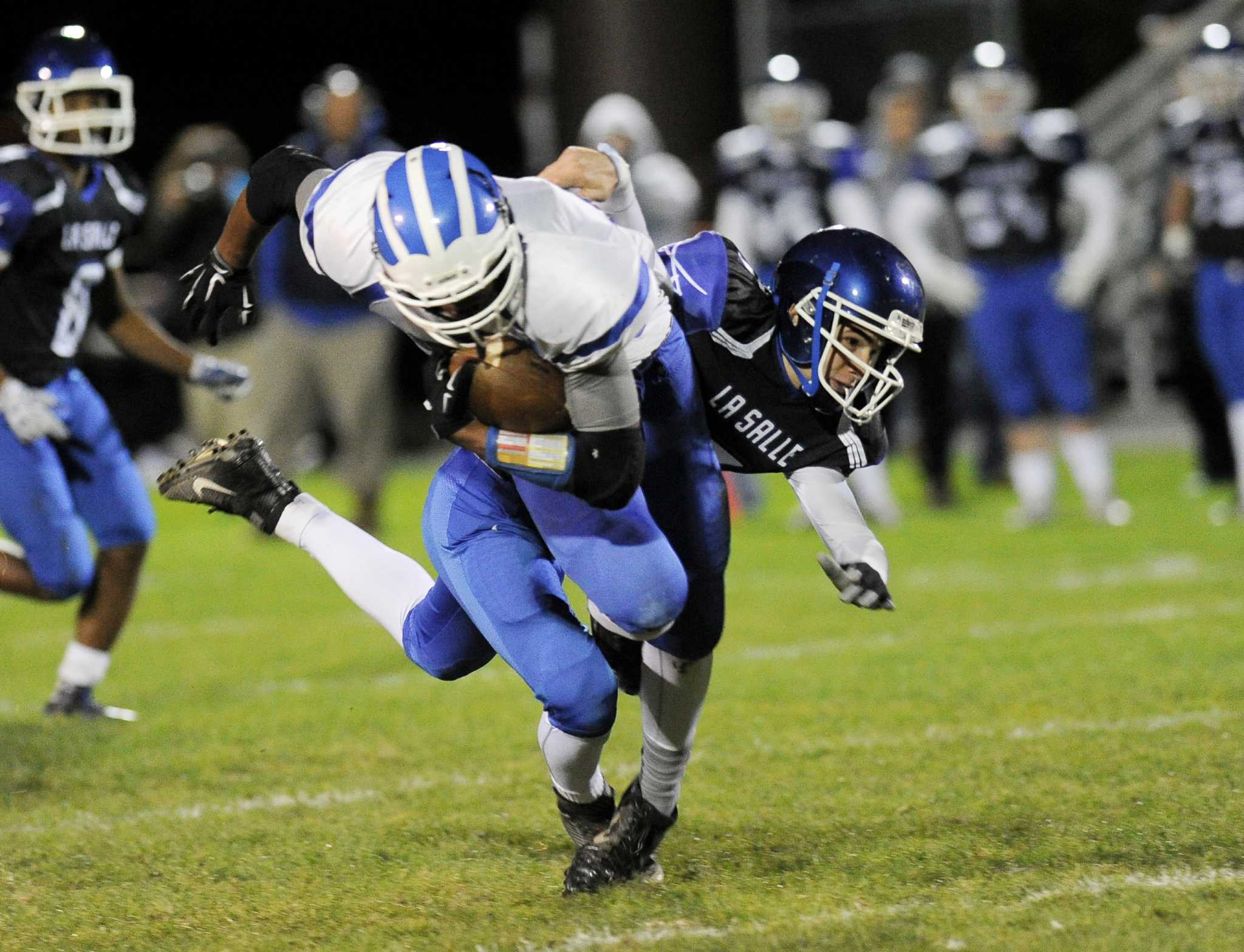 Brandon Barlow helps lead the way for Shaker football