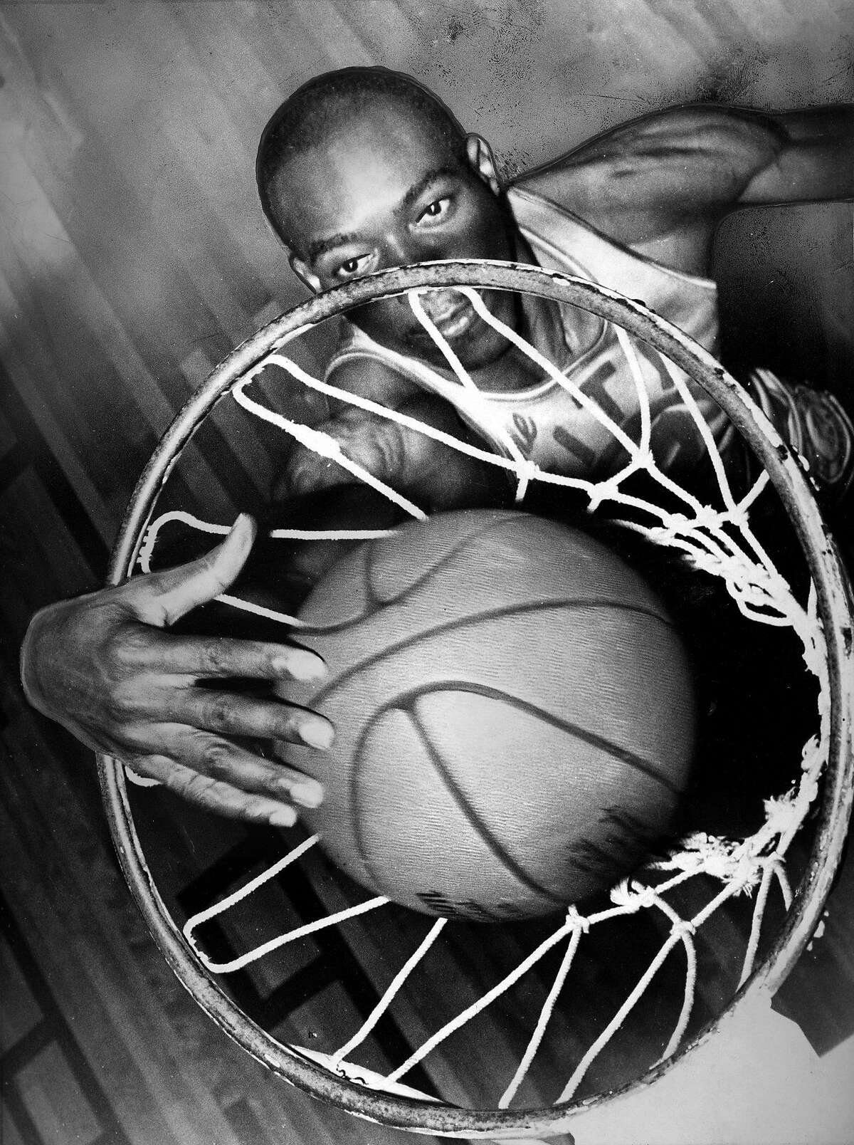 Warriors center Nate Thurmond dunks a basketball on March 15, 1967.  