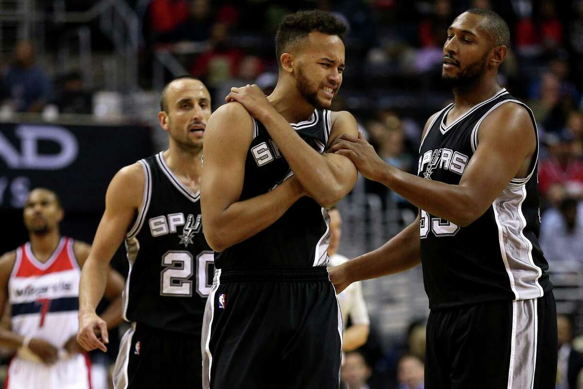Kyle Anderson of the Spurs reacts after being fouled against the Washington Wizards during the first half at Verizon Center on Nov. 4, 2015.