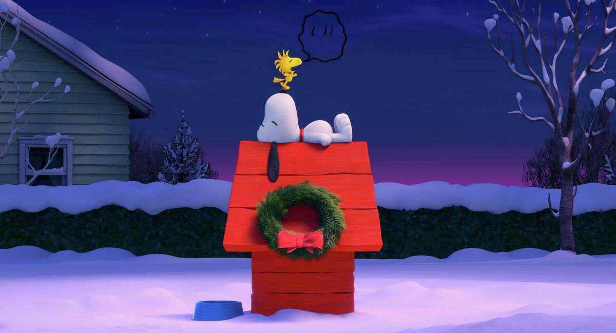 In this photo provided by Twentieth Century Fox & Peanuts Worldwide LLC, before their next big airborne adventure, Snoopy and Woodstock have a quiet moment in the new film, "The Peanuts Movie." The movie releases in U.S. theaters Nov. 6, 2015. (Twentieth Century Fox & Peanuts Worldwide LLC via AP)