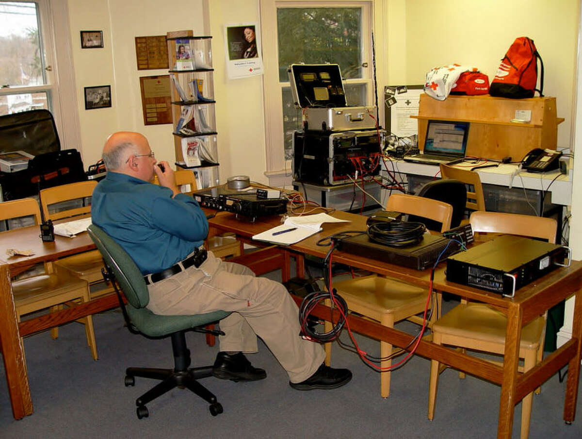 Jon Perelstein of Stamford operates a ham radio at the American Red Cross. Perelstein, 66, has been a ham enthusiast since he was 15.