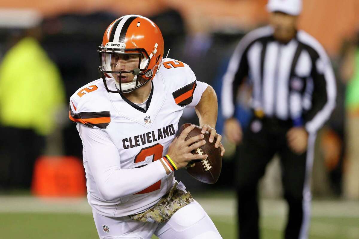 Browns quarterback Johnny Manziel looks to make a play against the Bengals on Thursday.