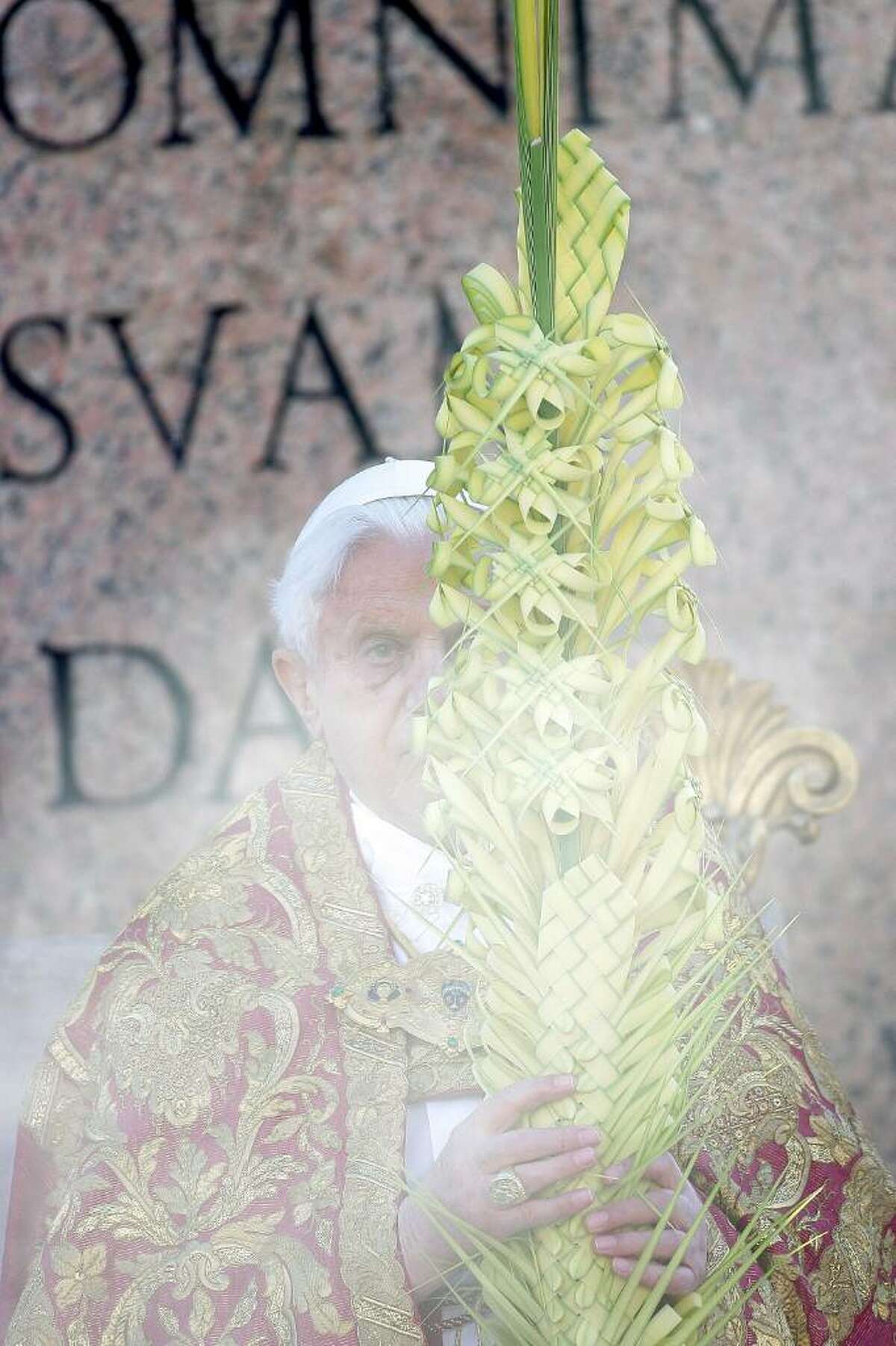 VATICAN CITY, VATICAN - MARCH 28: Pope Benedict XVI attends Palm Sunday Mass on March 28, 2010 in Vatican City, Vatican. The Pope is now facing pressure over abuse allegations which involved the German, the American and the Irish Catholic Church. (Photo by Franco Origlia/Getty Images) *** Local Caption *** Benedict XVI