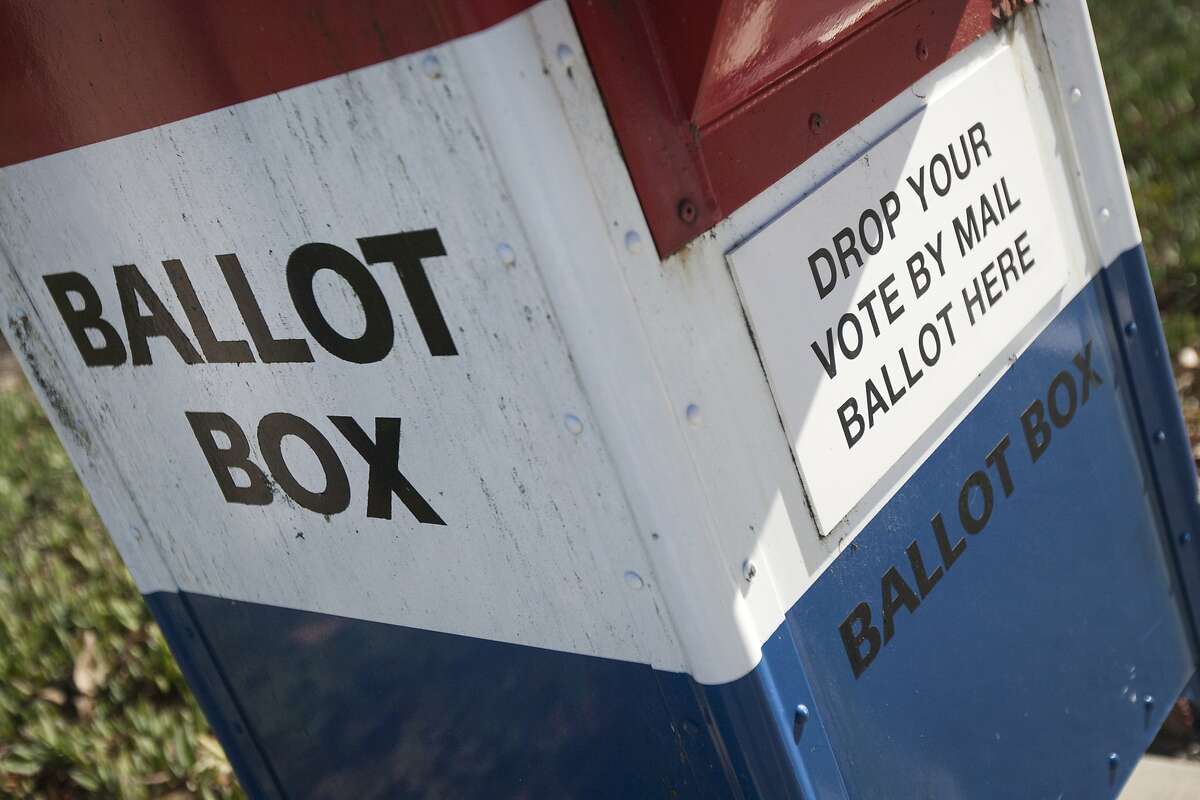 A ballot box is seen outside the San Mateo County Election's Office, Friday, Nov. 6, 2015, in San Mateo, Calif. An all-mail election was held in San Mateo County. Officials are expecting a higher voter turnout and believe an all-mail election is more convenient to voters.
