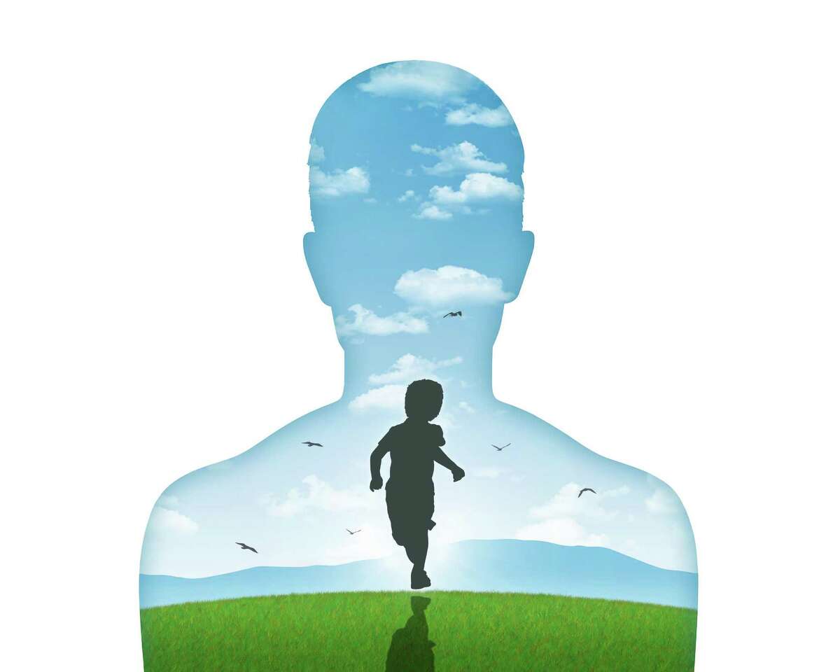 silhouette of a young man's portrait showing his inner child living in his mind