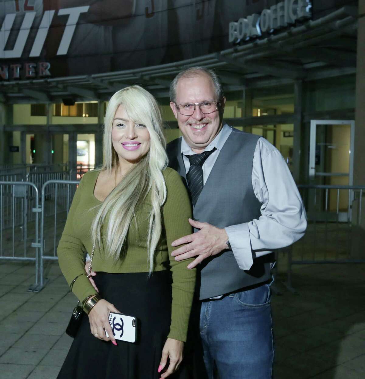 People pose for a photo before the Billy Joel concert at the Toyota Center Friday, Nov. 6, 2015, in Houston.
