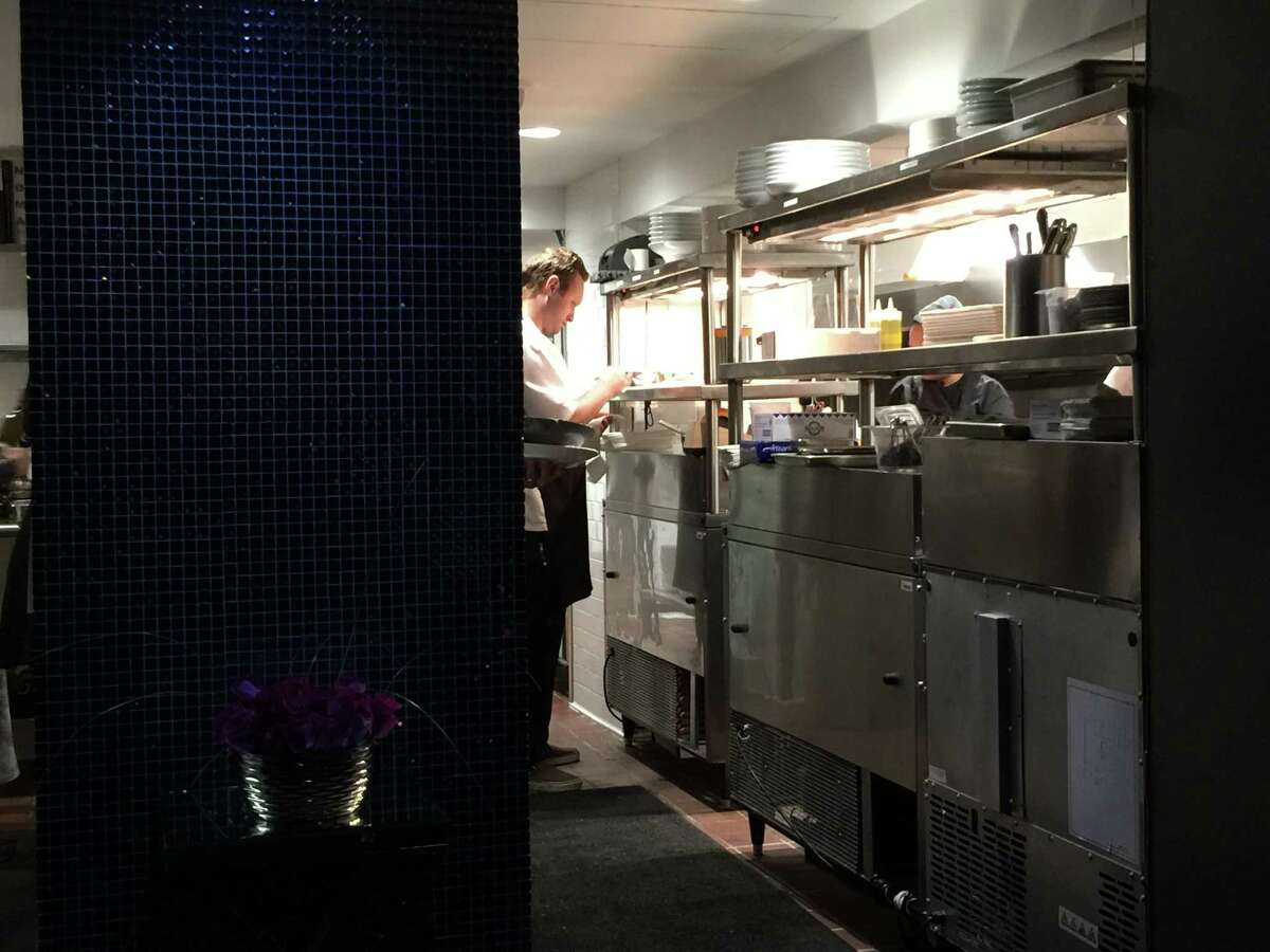 Inside the kitchen of Rebelle, the new restaurant at the St. Anthony Hotel.