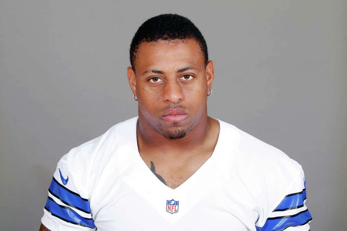 This is a 2015, file photo showing Greg Hardy of the Dallas Cowboys NFL football team. Dallas defensive end Greg Hardy's suspension for his role in a domestic violence case has been reduced from 10 games to four. NFL spokesman Brian McCarthy announced arbitrator Harold Henderson's decision Friday, July 10, 2015. (AP Photo/File)