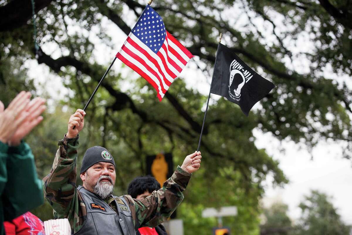 U.S. Army veteran Sabas Sauceda cheers during the U.S. Military Veterans Parade in front of the Alamo Saturday. A reader honors her father, along with the multitude of others who proudly served their country.