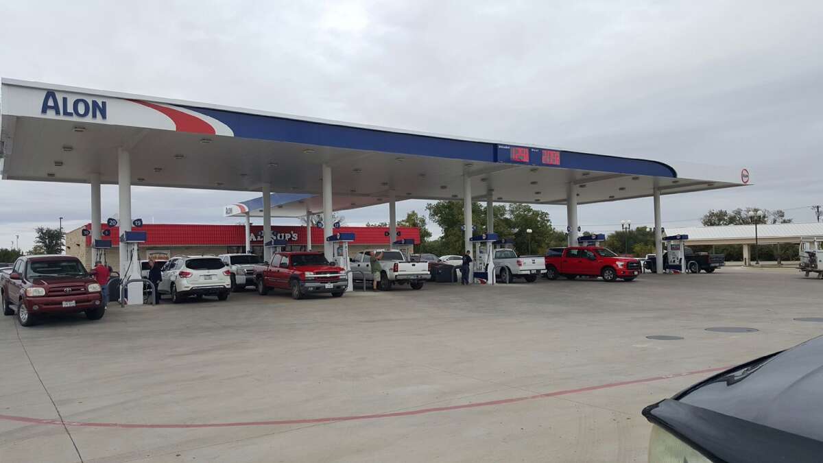 Cars line up at a gas station located at 2725 W Washington St. in Stephenville, Texas on Nov. 9, 2015.