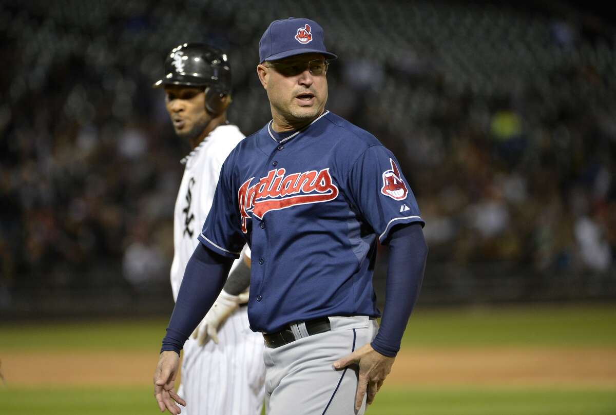 CHICAGO, IL - Manny Acta #11, formerly of the Cleveland Indians, stands on the field after arguing a call against the Chicago White Sox at U.S. Cellular Field on September 24, 2012 in Chicago, Illinois. The White Sox defeated the Indians 5-4. (Photo by Brian D. Kersey/Getty Images)