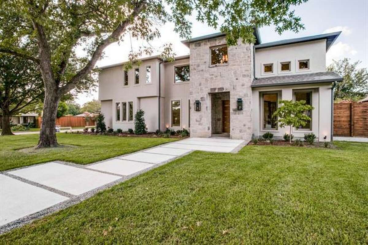 Dallas Mavericks point guard J.J. Barea bought this home in the Preston Dell Estates for $1.6 million. The five-bedroom, 5.5-bathroom home was built by Ken Ellefson of Lm2Group and listed by Stevie Chaddick from Coldwell Banker.