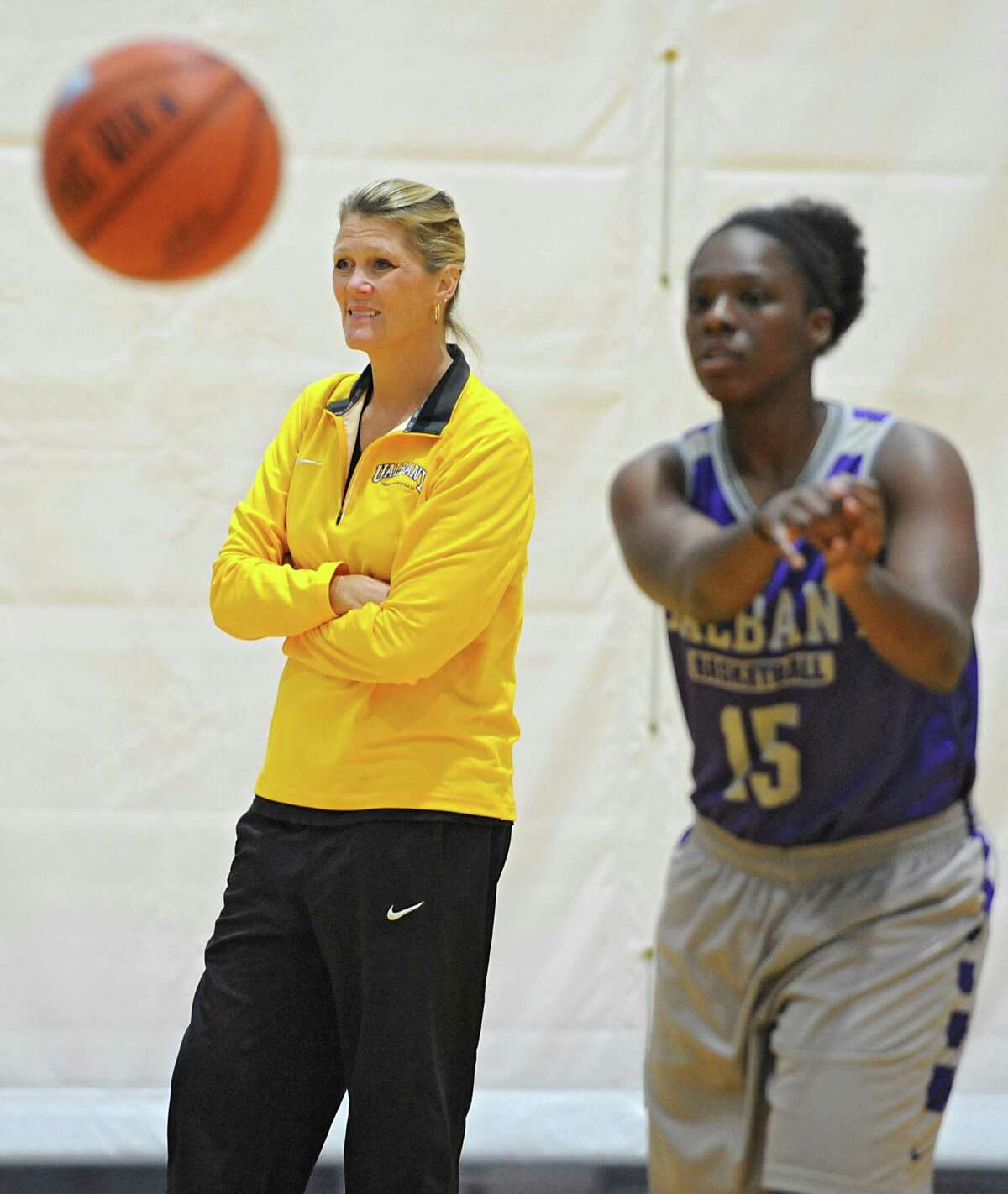 UAlbany women's basketball coach Katie Abrahamson-Henderson, left, watches her team during practice on Thursday, Oct. 15, 2015 at the SEFCU Arena in Albany, N.Y. (Lori Van Buren / Times Union)