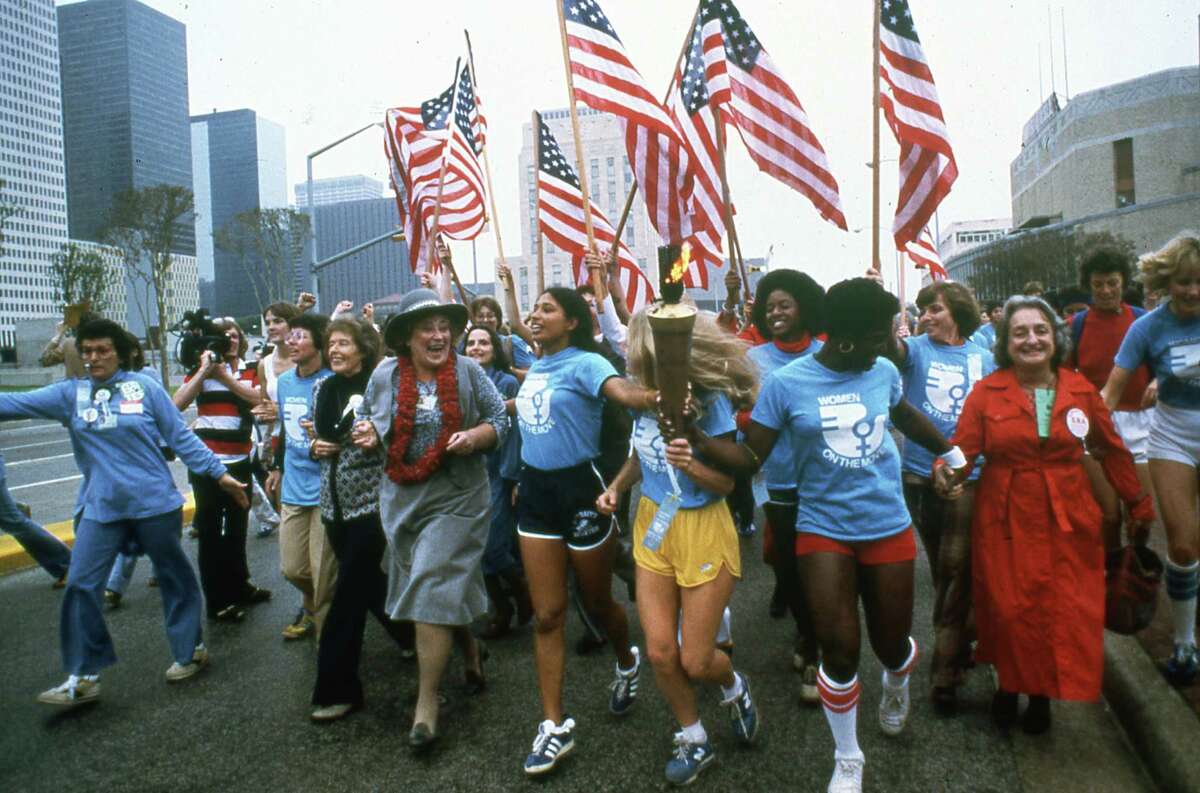 Leaders of the women's movement march in Houston, including Billie Jean King, U.S. Rep. Bella Abzug and Betty Friedan in '77.