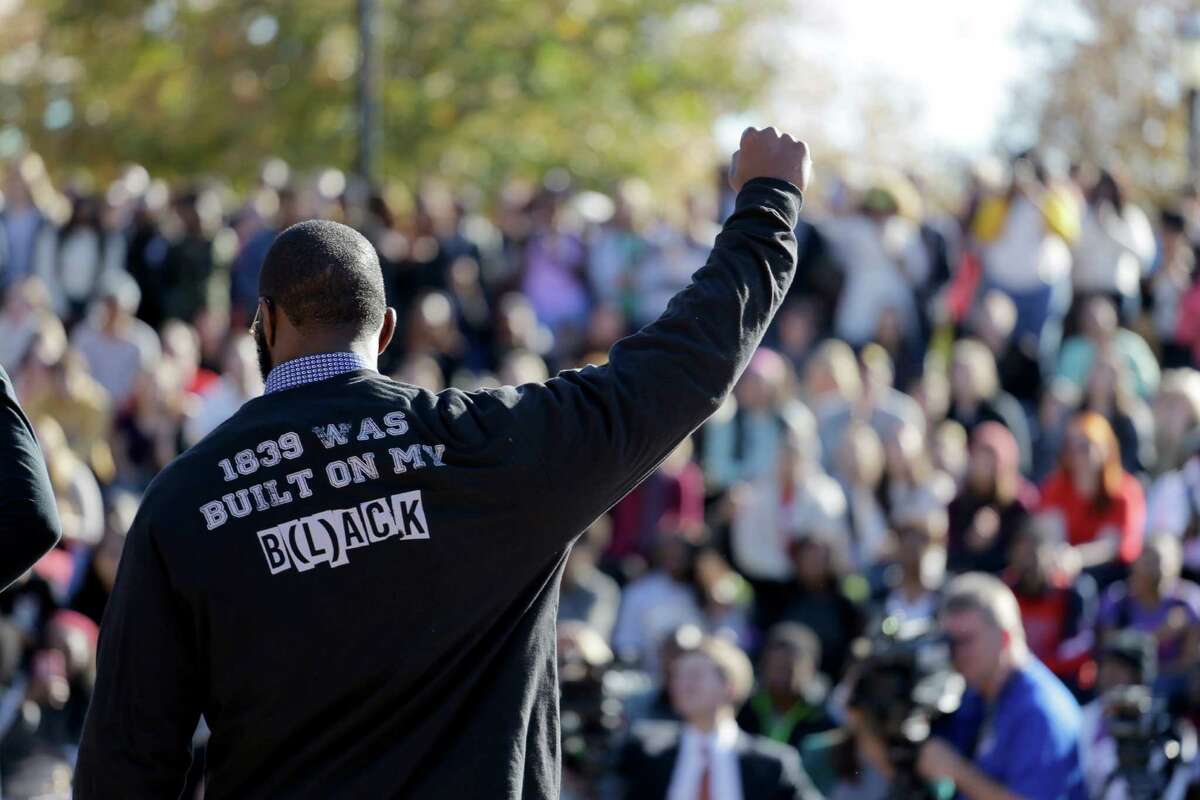 A member of the black student protest group gestures while addressing a crowd following the announcement that University of Missouri System President Tim Wolfe would resign, at the university in Columbia, Mo. Few paid attention when a black student started a hunger strike at the University of Missouri to protest racial strife on campus. As soon as the football team supported that hunger strike by refusing to practice for or play in the schoolâs lucrative NCAA games, the universityâs president and chancellor were forced out and changes were discussed. (AP Photo/Jeff Roberson, File)