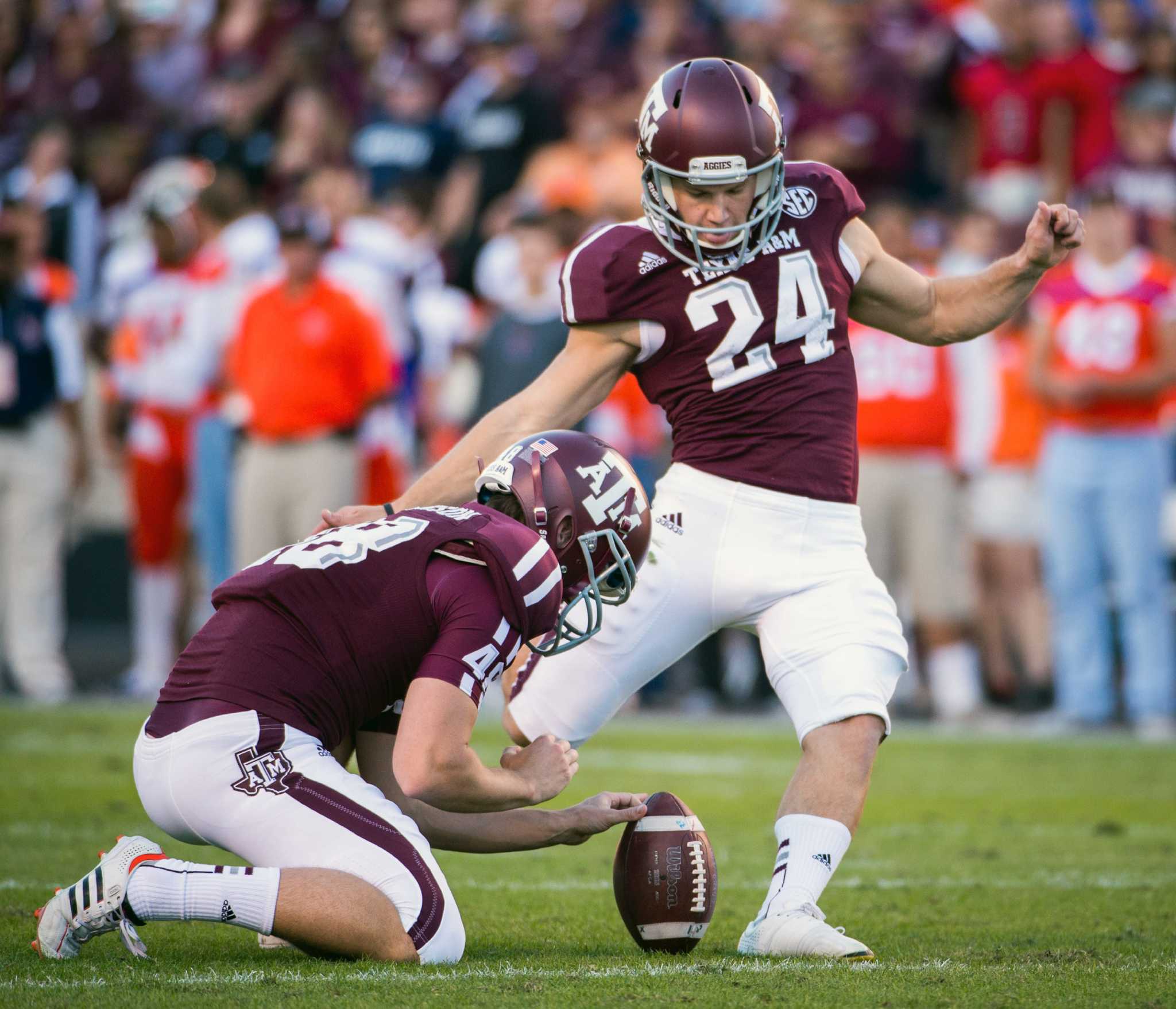 College Station, TX, USA. 26th Oct, 2013. Texas A&M punter kicker Josh Lambo  #49 warms up before NCAA football game kickoff at Kyle Field in College  Station, TX. © csm/Alamy Live News