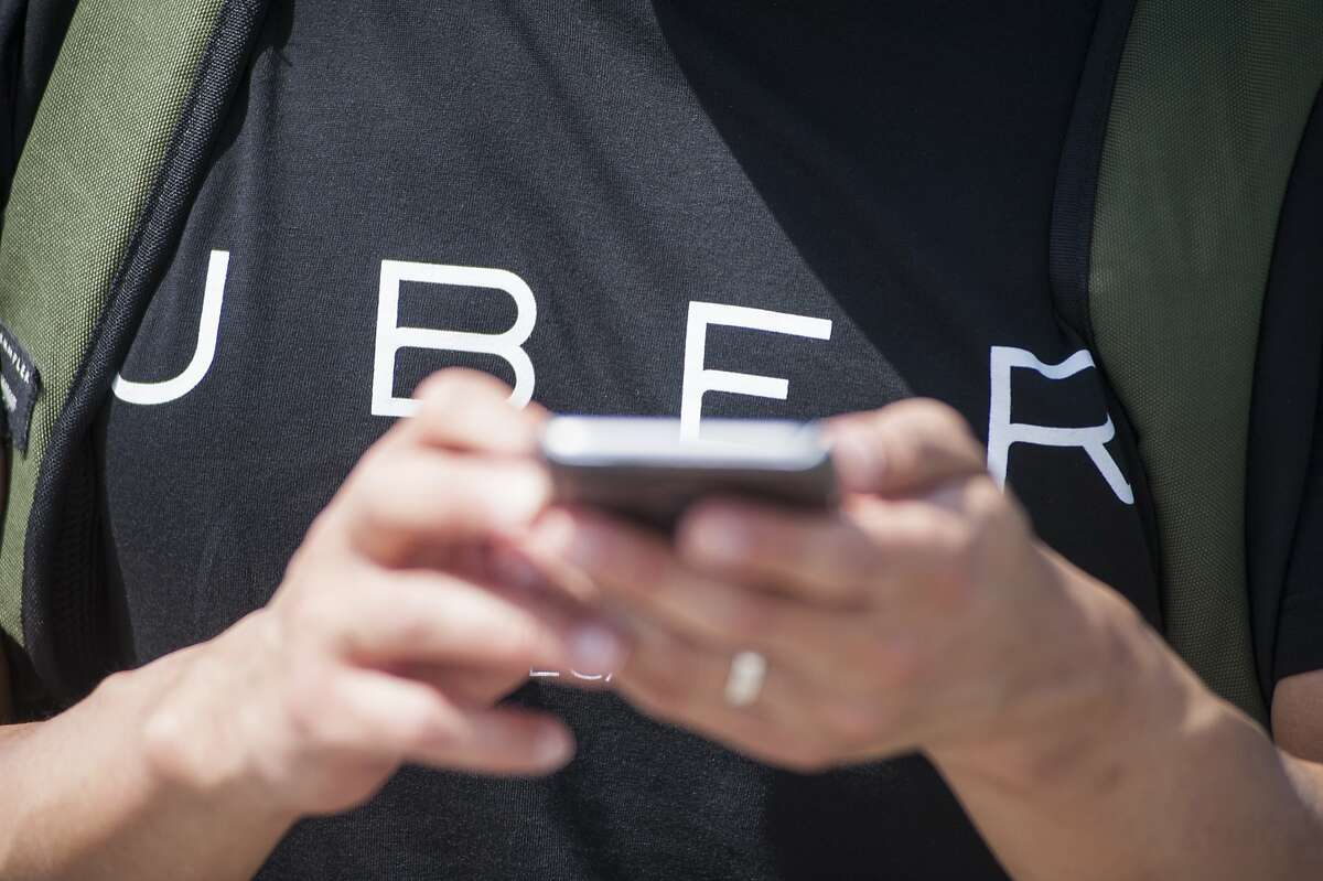 Uber is getting backlash for charging donors a processing fee on Veterans Day donations. (Photo by Martin Ollman/Getty Images)