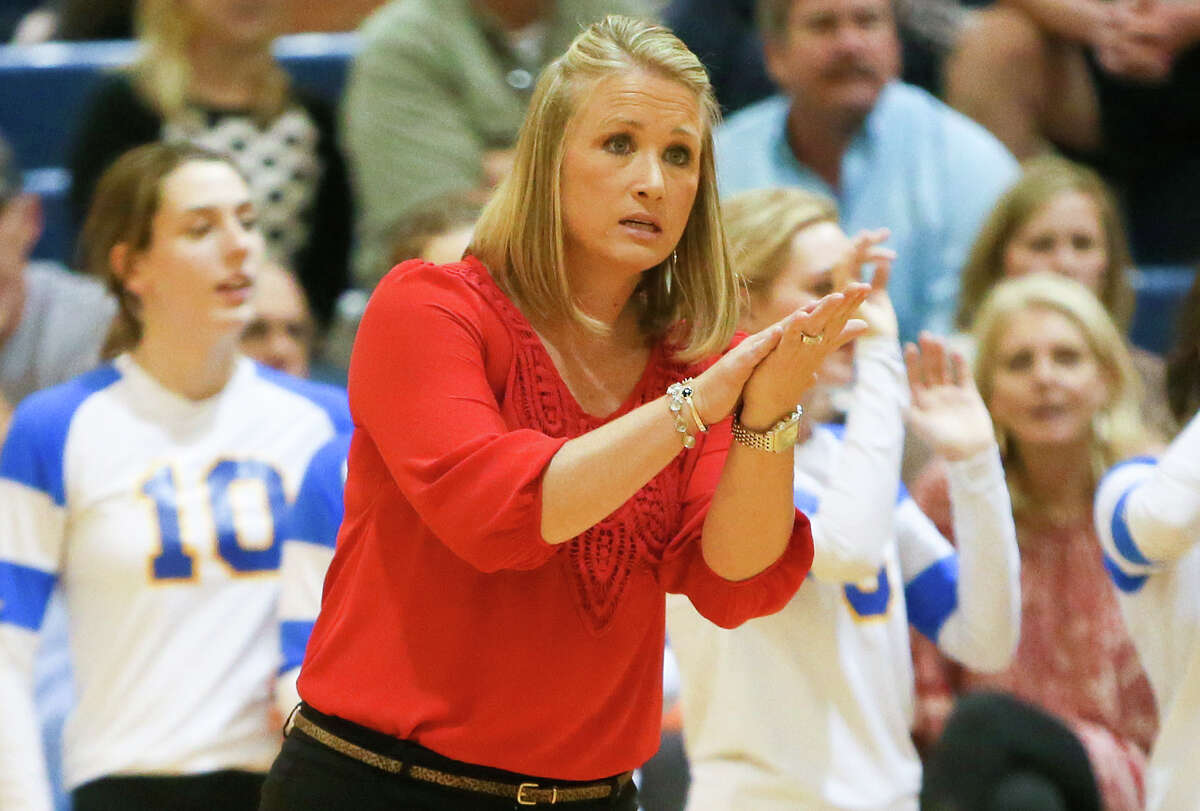 Alamo Heights coach Courtney Patton encourages her team from the sideline during their District 27-5A volleyball match at Boerne Champion on Oct. 20, 2015.
