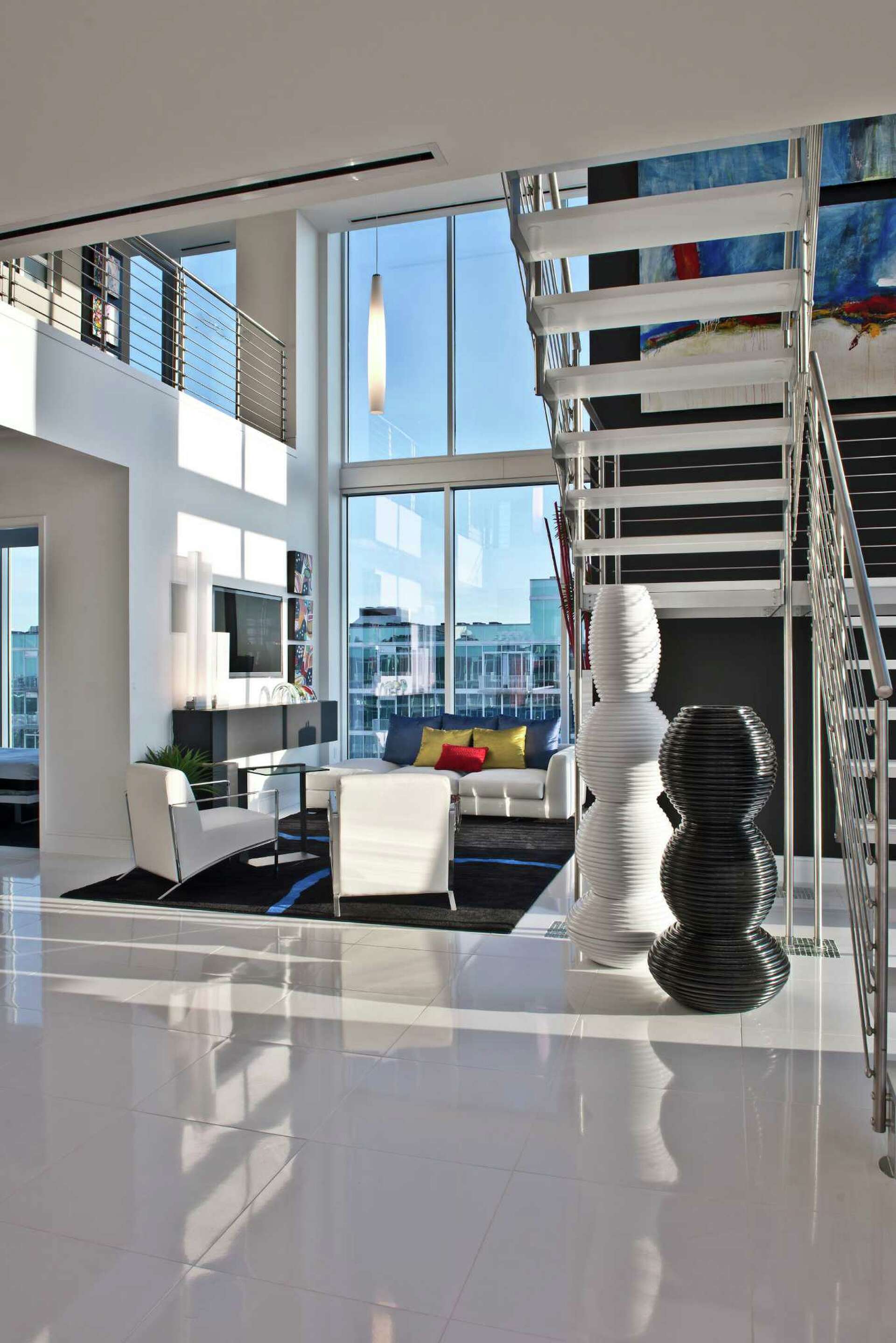 Renovation turns penthouse into an open, airy party pad