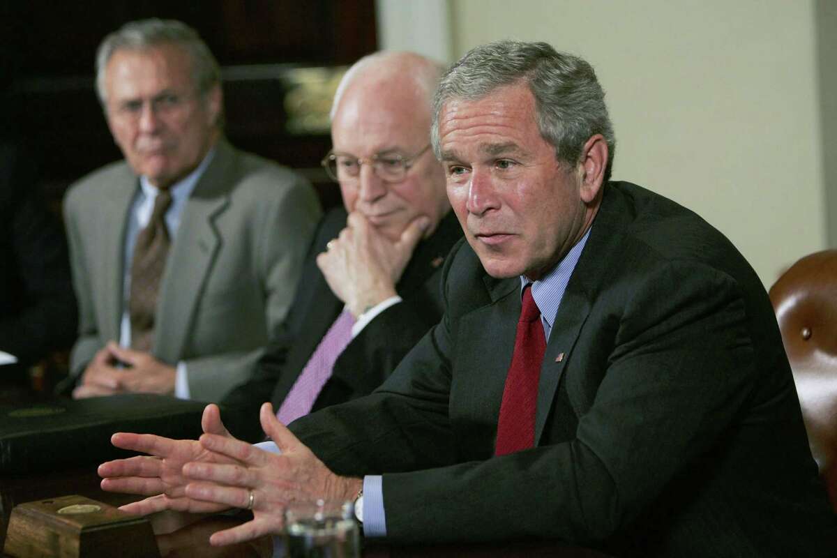 Former President George W. Bush meets with the Iraq Study Group, including Secretary of Defense Donald Rumsfeld, left, and Vice President Dick Cheney, center, in 2006. A reader agrees witht he criticism former President H.W. Bush hurled at Rumsfeld and Cheney in a new book.