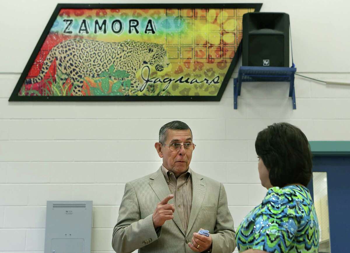 South San Antonio ISD Superintendent Dr. Abelardo Saavedra, left, chats with Pricipal Patricia Annunzio as he visits Zamora Middle School. Friday, March 28, 2014.