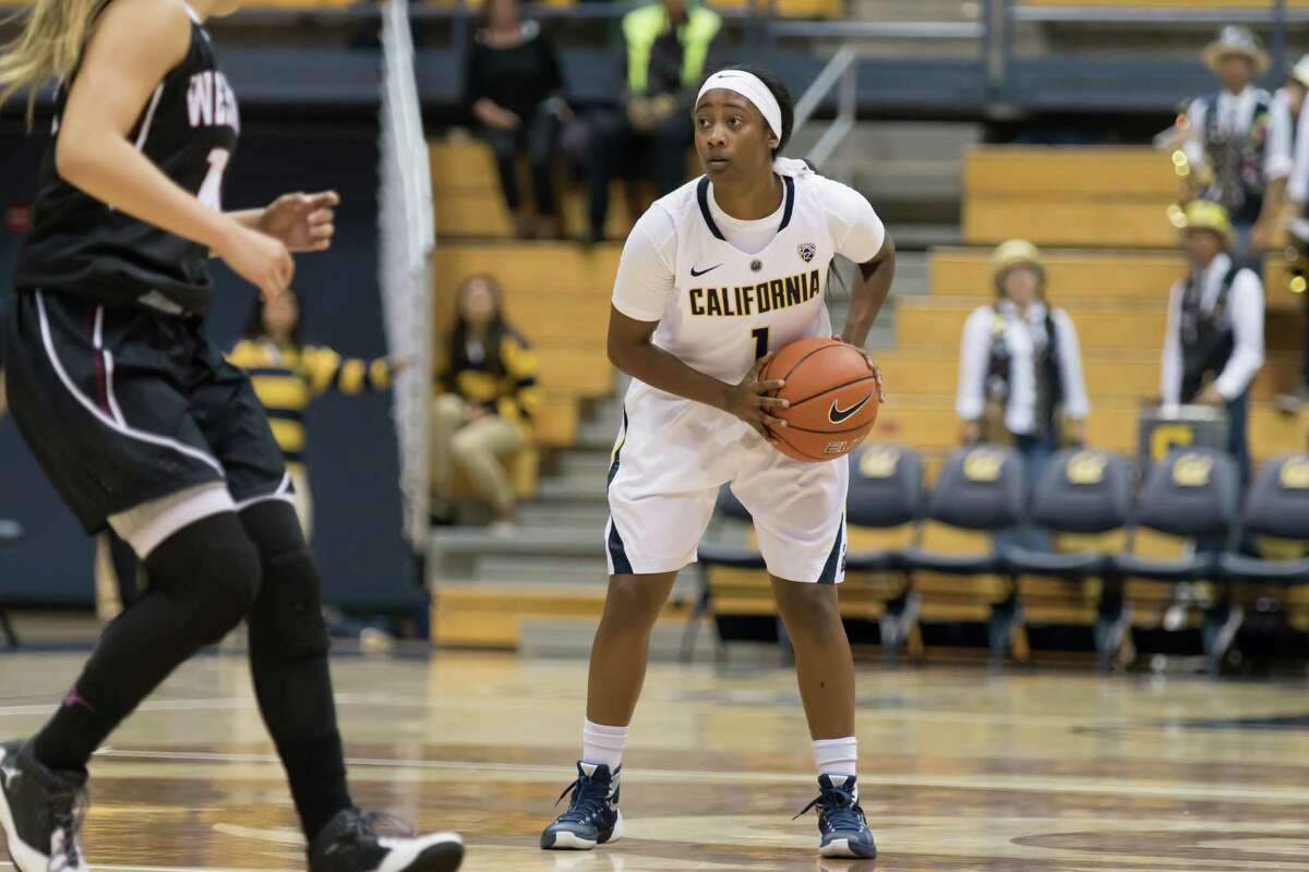 Guard Asha Thomas scans the court during the Bears’ exhibition win Sunday over Westmont.