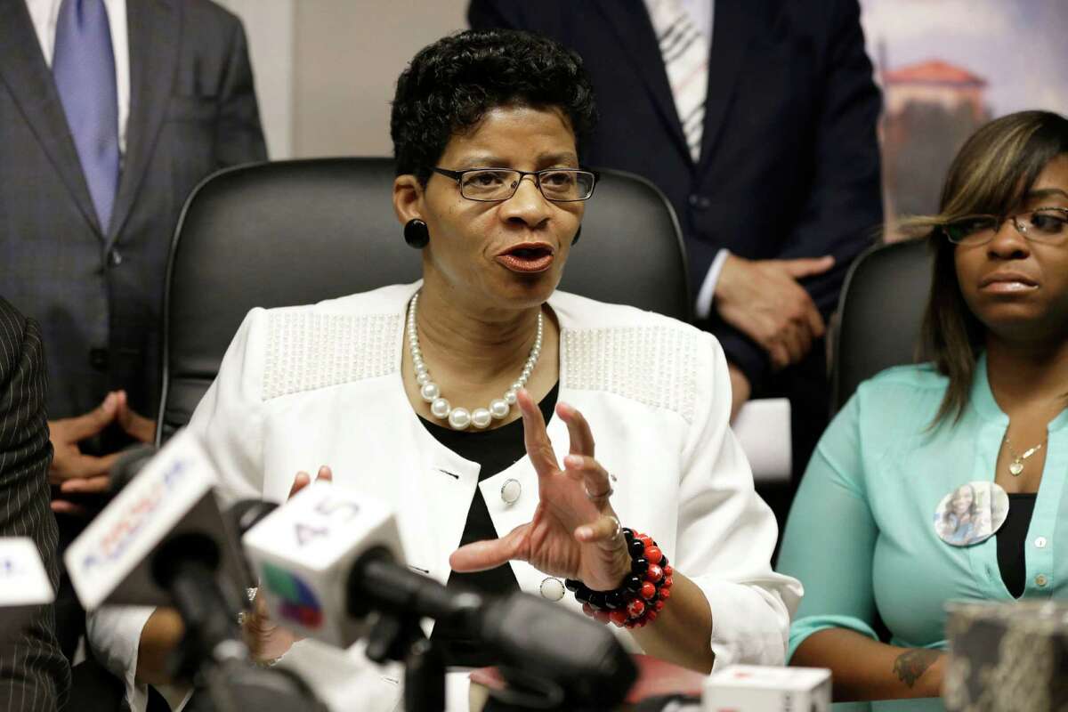 Geneva Reed-Veal, mother of a black woman found dead in a Waller County jail three days after a confrontation with a white state trooper, speaks at a press conference with her daughter Sierra Cole (right) on Aug. 4, 2015, in Houston. The family filed a federal lawsuit against the trooper and several others.