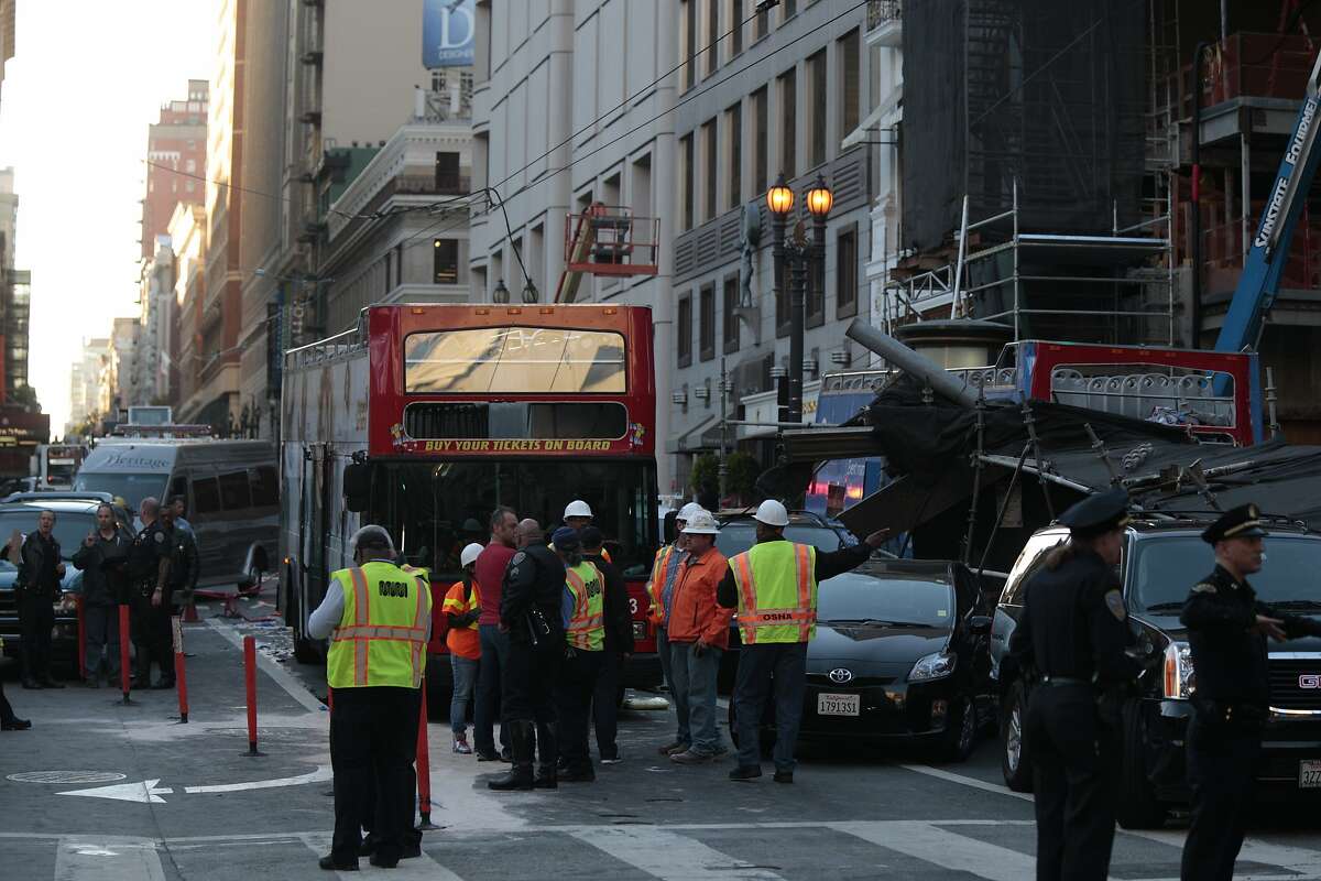 A bus collided with scaffolding on Post street in Union Square on Friday, Nov. 13, 2015 in San Francisco, Calif.