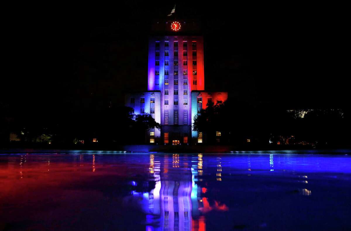 Houston's City Hall building is lit up in the colors of the French flag, Friday, Nov. 13, 2015. Over 100 people are reported dead in a series of attacks in Paris Friday.