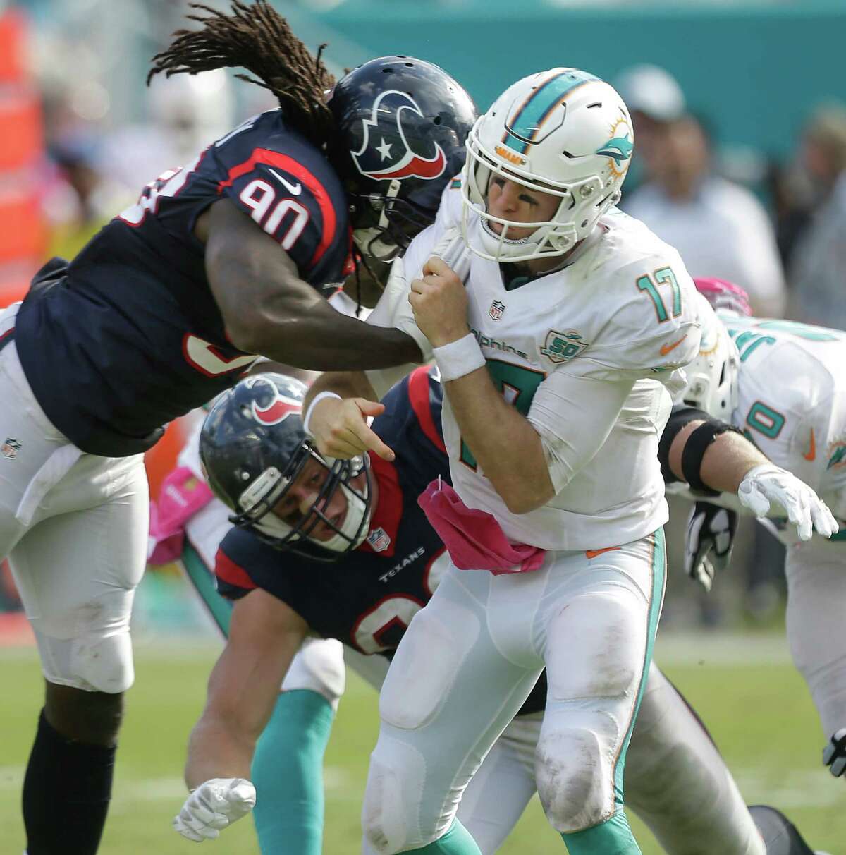 During a respite between numerous injuries that have sidelined him for 13 of his first 24 NFL games, Texans linebacker Jadeveon Clowney, left, got his lone sack against Miami last month.