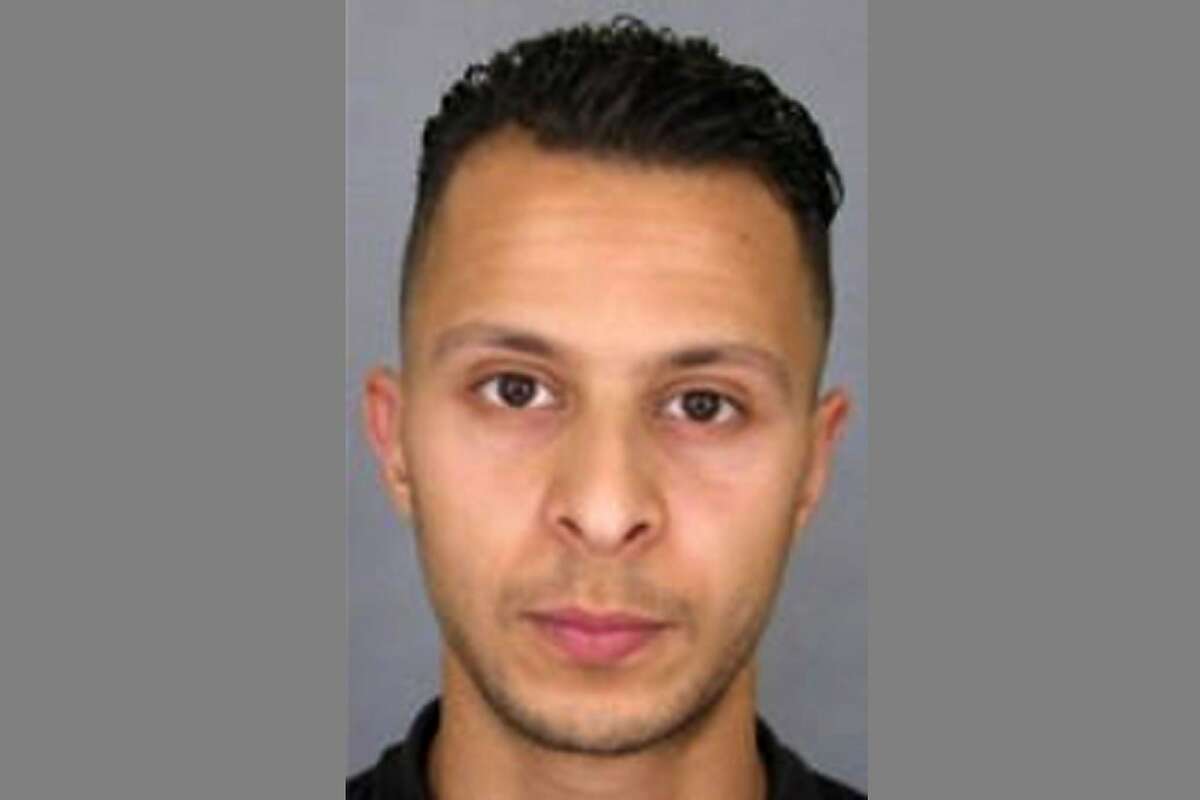 This handout image, "appel a temoins" (call for witnesses), released by the French Police information service (SICOP) on November 15, 2015 shows a picture and description of Abdeslan Salah, suspected of being involved in the attacks that occurred on November 13, 2015 in Paris.