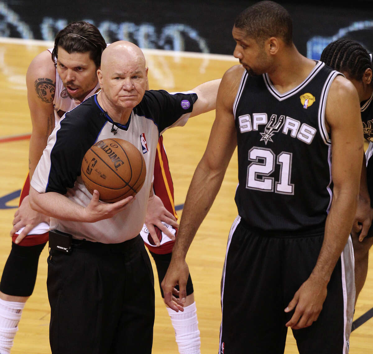 Spurs’ Tim Duncan looks at referee Joey Crawford during the first half of Game 6 of the NBA Finals at American Airlines Arena on June 18, 2013, in Miami.