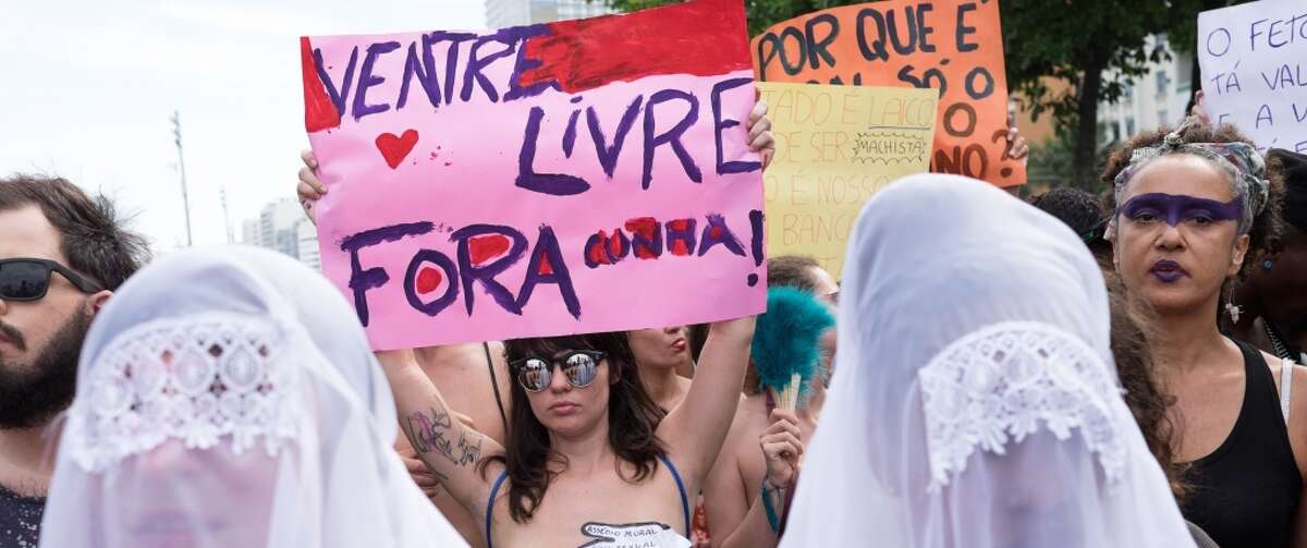 Women take part in the "Slutwalk" against the president of the Brazilian Chamber of Deputies Eduardo Cunha at Copacabana beach in Rio de Janeiro, Brazil on November 14, 2015.