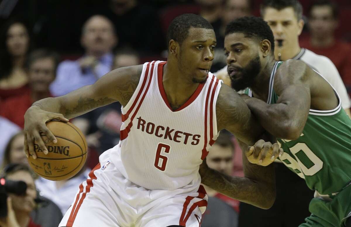 Houston Rockets Terrence Jones is guarded by Boston Celtics Amir Johnson during the first half of NBA game at Toyota Center Monday, Nov. 16, 2015, in Houston. ( Melissa Phillip / Houston Chronicle )