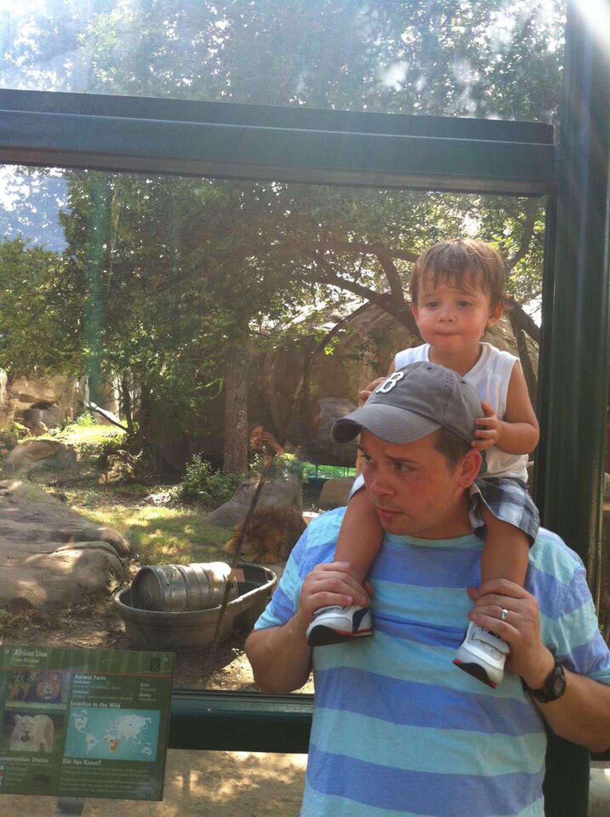 Chris Brann with his son Nico at the Houston Zoo in 2011. Image courtesy of Chris Brann