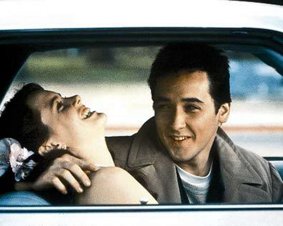 John Cusack and Ione Skye star in the classic 1989 romantic comedy "Say Anything." Cusack will take part in a screening of the movie at the Tobin Center for the Performing Arts.