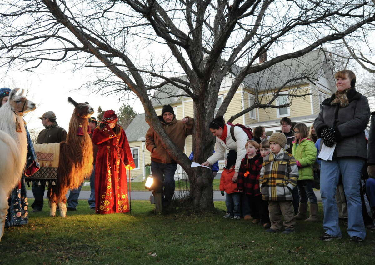 People sing Christmas songs at the living nativity at the 10th Annual Altamont Victorian Holidays event on Sunday, Dec. 11, 2011 in Altamon, N.Y. (Lori Van Buren / Times Union)