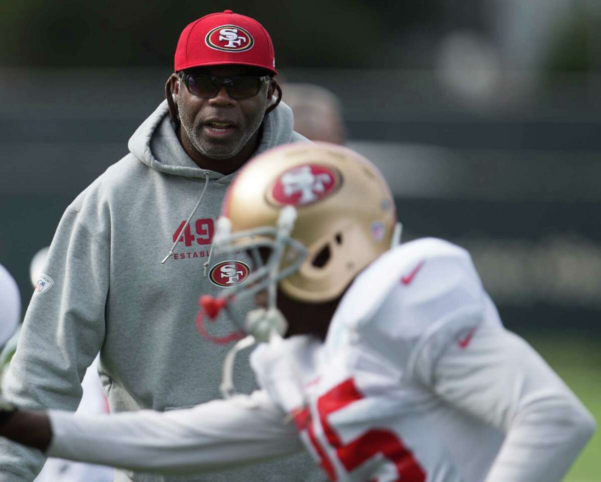 Niners secondary coach Tim Lewis.
