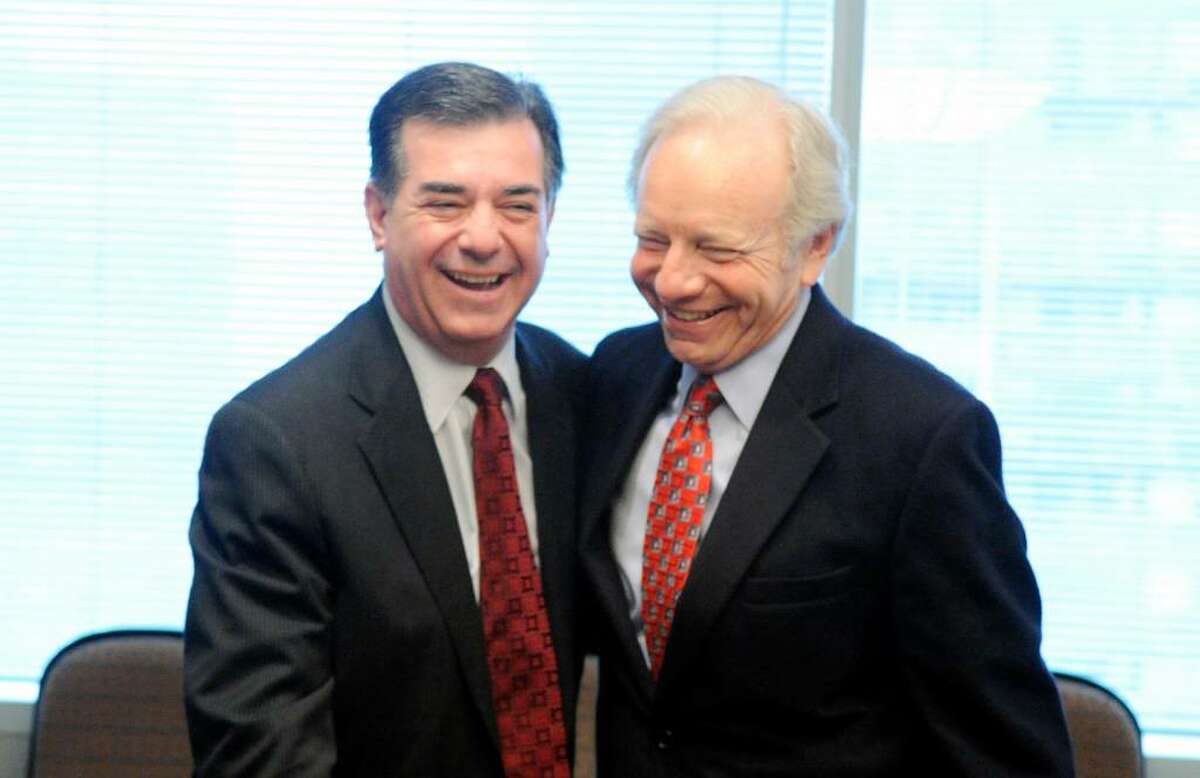 Senator Joe Lieberman, I-Conn., and Stamford Mayor Michael Pavia share a laugh as they meet in Stamford City Hall to discuss the proposed site of the Atlantic Street underpass project Monday morning March 29, 2010. The City of Stamford has requested federal funding for the project which will widen the railroad underpass on Atlantic Street near the Stamford train station, alleviating traffic.