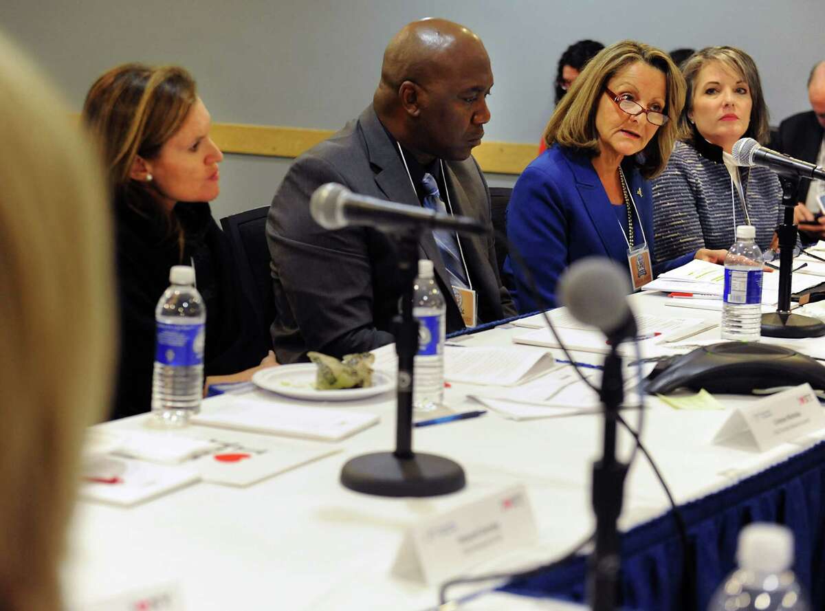 Jan Marie Chesterton of the tourism advisory council, second from right, speaks during a panel discussion on developing tourism in NYS the Empire State Plaza on Wednesday, Nov. 18, 2015 in Albany, N.Y. (Lori Van Buren / Times Union)
