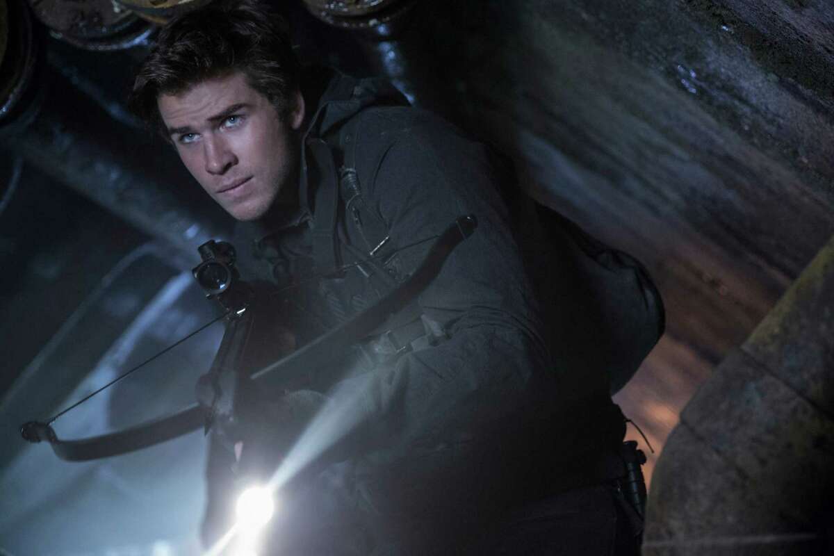 This image released by Lionsgate shows Liam Hemsworth as Gale Hawthorne in a scene from "The Hunger Games: Mockingjay Part 2." (Murray Close/Lionsgate via AP)
