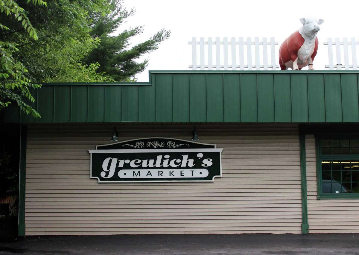 Greulich's iconic cow has new home at Guilderland library