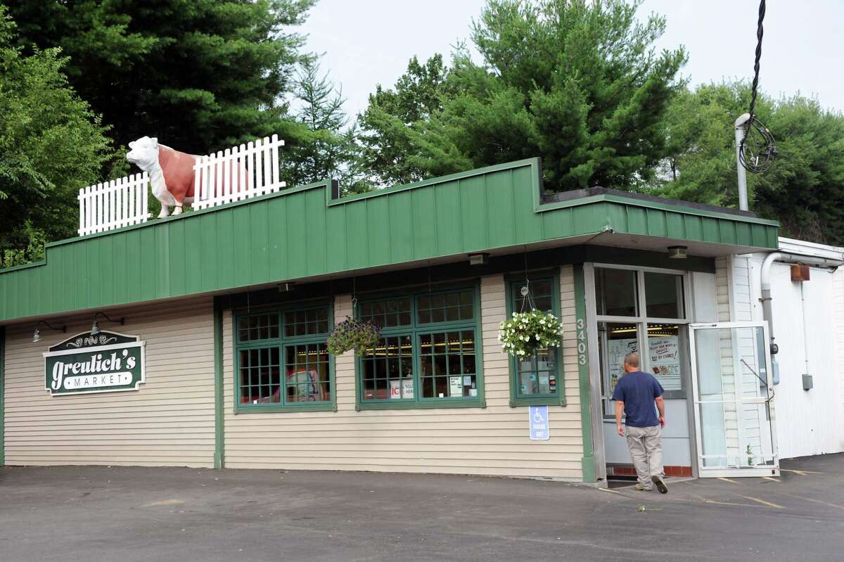 Greulich's iconic cow has new home at Guilderland library