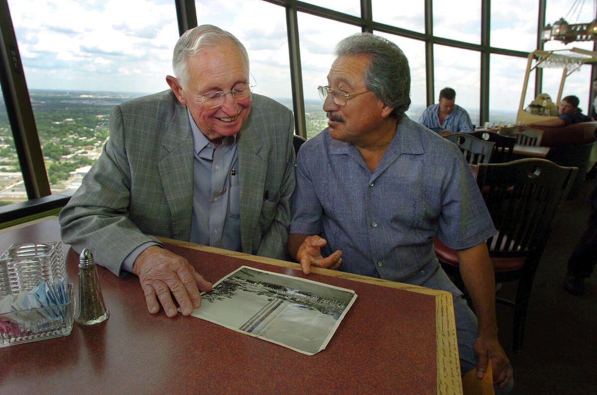 In this file photo, Jim Hasslocher is pictured with a longtime employee of what was then the Tower restaurant.