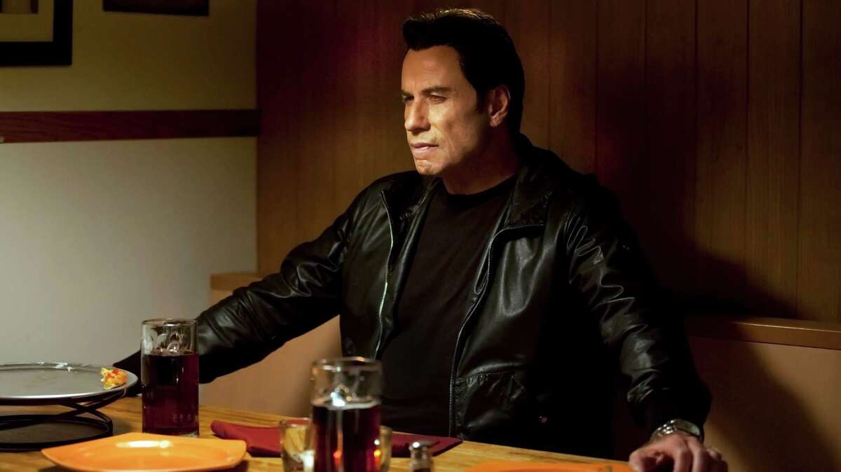 John Travolta in the thriller "CRIMINAL ACTIVITIES"