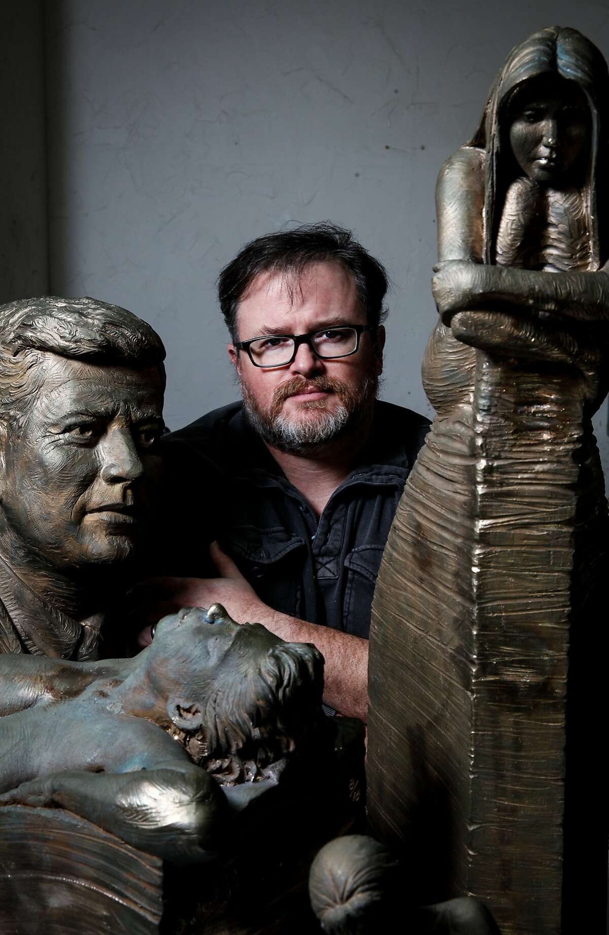 Sculptor Steven Whyte in his studio with some of his bronze sculptures in Carmel, Calif., Tuesday, November 17, 2015.