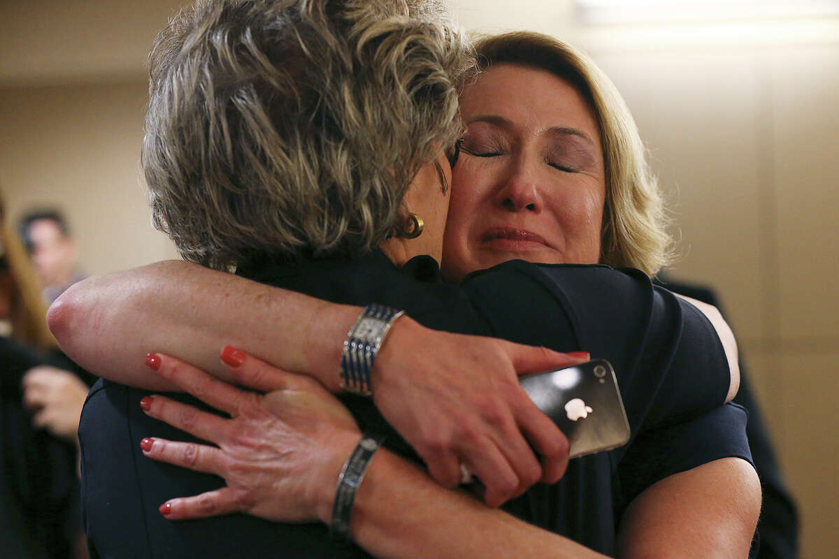 Bexar County Sheriff's Sgt. Yvonne Vann, right, is comforted by Bexar County Sheriff Susan Pamerleau after Mark Anthony Gonzalez is found guilty of capital murder during a trial in the Bexar County 175th District Court, Monday, Oct. 12, 2015. Gonzalez killed Vann's husband, Bexar County Sheriff's Sgt. Kenneth Vann, in May 2011.