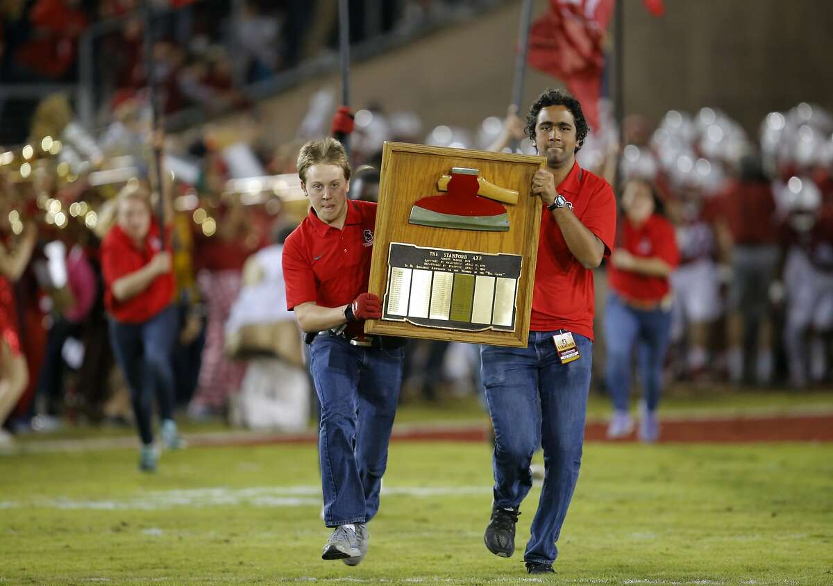Stanford students parde the Axe out onto the field before the game as the Cardinal prepares to take on California in the 118th Big Game at Stanford Stadium, on Sat. November 21, 2015, in Stanford, Calif.
