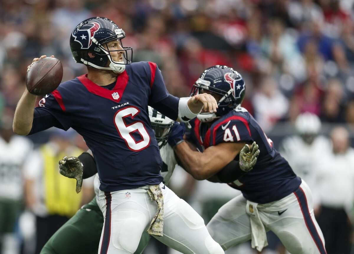 Houston Texans quarterback T.J. Yates (6) drops back to pass during the second quarter of an NFL football game at NRG Stadium on Sunday, Nov. 22, 2015, in Houston. ( Karen Warren / Houston Chronicle )